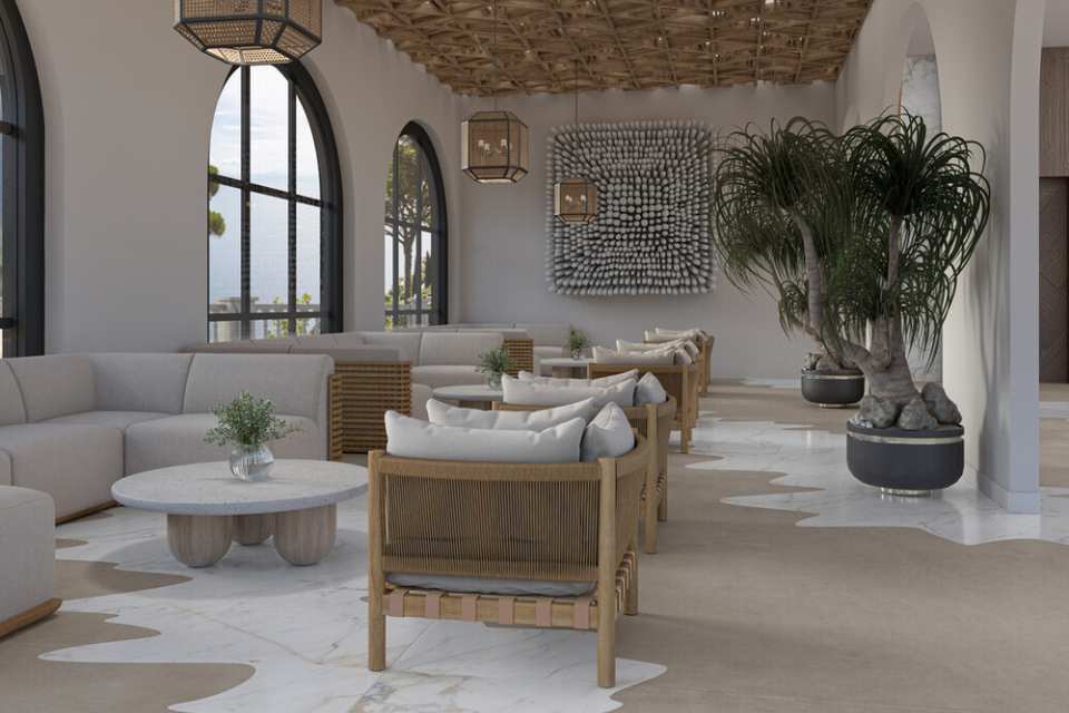 coastal living room with rattan chairs, woven lamp lights and greenery